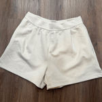 Nike  Dri-FIT 24.7 Athletic Shorts Womens Size L Beige Lightweight Sweat Shorts Photo 0