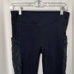 Fabletics  Black High-Waisted 7/8 Pocket Leggings with Mesh Sides Size Medium Photo 1
