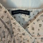 Brandy Melville Floral White Spaghetti Strap Top Photo 1