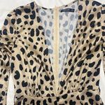 Nasty Gal Dalmatian print satin romper- worn once!  Doesn’t include belt! Photo 3