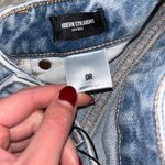 EXPRESS Light Wash Slight Distressed Jeans Photo 4