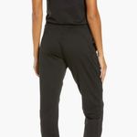 Sweaty Betty  Gary Jumpsuit Scoop Neck Sleeveless Racerback in Black Size L Photo 3