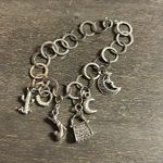 Silver Charm Bracelet with Moon and Star Accents Photo 1