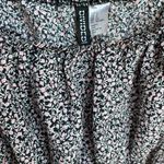 Divided Baby doll floral blouse. Size small Photo 2