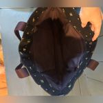 Coach Black Tote with Floral and Snoopy Design Photo 9