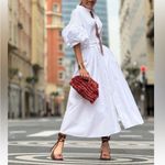 MARIELLE Almelo
Phoebe White Tiered Puff
Sleeve Sundress
One size fits all 6 Photo 6