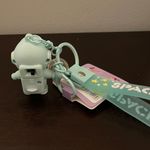 Cute cartoon Astronaut with the sunset light keychain Green Photo 4
