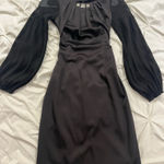 Elegant Black Dress with Sheer Sleeves Size 32 Photo 0