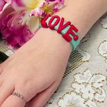 LOVE Slider Charm Bracelet Mint and Coral Pink Photo 0