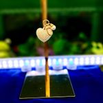 A sweet little heart charm or keychain with tiny pearls on it. The picture doesn’t do it justice. Smoke free home. Photo 6