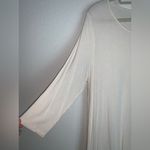 Blush Noir : Asymmetrical Hem Creme Tunic with Delicate Lace details. Photo 5