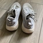 New Balance  gray tennis shoes Photo 3