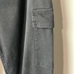 Kendall + Kylie Kendell and Kylie black paper bag pants. Cargo pockets in size large. Photo 3