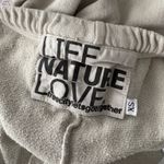 Free City Greyish green  sweatpants size xs. No tears or stains. Super cute! Photo 2