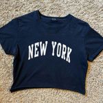 Brandy Melville Women’s Blue Graphic Crop T-Shirt Photo 0