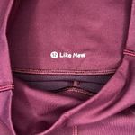 Lululemon (Like New) In Movement Tight 25" *Everlux in Garnet, Size 2 Photo 6