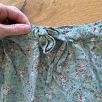 Brandy Melville  - Ties Waist Tiered Floral Mini Skirt in Green Photo 4