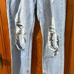 Princess Polly Ripped Light Blue Straight Jeans Photo 1