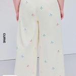 Cider Mid Rise Bowknot Pocket Wide Leg Trousers Curve & Plus Photo 4