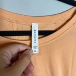 Athleta  apricot long sleeve athletic top Photo 1