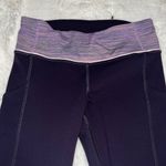 Lululemon speed up leggings 28” color; Dark Purple w/ Pink stripes size 4 EUC Photo 2