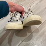 Tory Burch  White Leather and Navy Blue Trimmed Ruffle Sneaker, women’s size 9.5 Photo 2