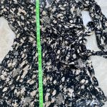 Free People All the Right Ruffles Romper in Raven Combo Button Back 3/4 … Photo 3