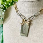 Coach  Gold Bow and Silver Hangtag Necklace Photo 2