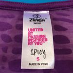 Zumba Wear Cut 'N Paste Purple Cut Up Over You V-Neck Top women’s size S‎ Photo 4