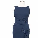 Betsy and Adam . Christine Scuba Crepe Ruffled Bow Gown. Photo 8