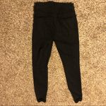 Reformation ❤️  black skinny jeans with knee rips Photo 4