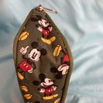 Disney  Mickey Mouse Cosmetic Bag. Green with Mickey Mouse printed all over. Photo 2