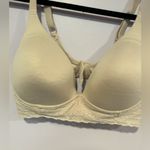 Deep plunge nude lace bra Size undefined Photo 1