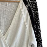 Free People  Auxton Thermal Wrap Top with a floral print Photo 10