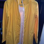 Primark yellow rain coat Photo 0