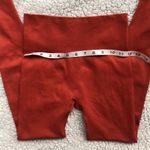 Orange high waisted yoga pants. Size XS. Orange Photo 1