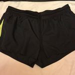 Nike  Women's Black and Yellow Athletic Shorts Photo 0