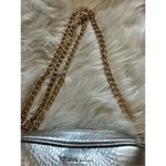 Victoria's Secret Victoria secret silver crossbody purse w gold chain and tassel Photo 2
