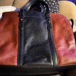 Fossil Elegant Black and Brown Leather Purse Photo 0
