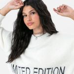 Adika  Limited Fuzzy Sweater Photo 0