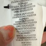 Calvin Klein Off White Dress Chiffon Bell Sleeve Crepe Sheath Size 8;; 22W New with tag Same day shipping Smoke and pets free Elevate your wardrobe with this stunning off-white dress. The charming Belle character design along with the round neckline and bell sleeves create a fashionable yet sophisticated look. The dress is made of high-quality chiffon fabric that provides comfort and durability. The zip closure adds a touch of elegance to the dress. The knee-length dress is perfect for any occasion, whether it's a formal event or a casual outing. The sheath style highlights your curves while the lined feature ensures a comfortable fit. The dress is available in sizes 8 to 22W, making it a perfect addition to any wardrobe. Photo 5