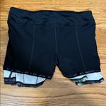 Lululemon Black and Floral Pleated Tennis Skort Photo 9