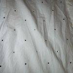 Elegant White Button Photo 1