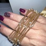 Tell Your Tale Guitar String Gold Tone With Faux Pearl Bracelet Set Photo 4