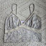 Blush Boutique  Snakeskin Lace Top Photo 0