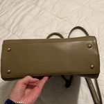 Beautiful green crossbody handbag Lots of details and pockets EUC Photo 3