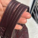 Isabella Fiore  Burgundy Tote with Braided Handles and Floral Embossing Photo 8