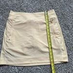 Athleta light yellow mini tennis skirt size 4 Photo 7