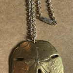 Gold Sand Dollar Pendant Necklace Photo 0