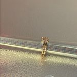 Beautiful gold ring with dainty flowers. There are three flowers adjustable Photo 5